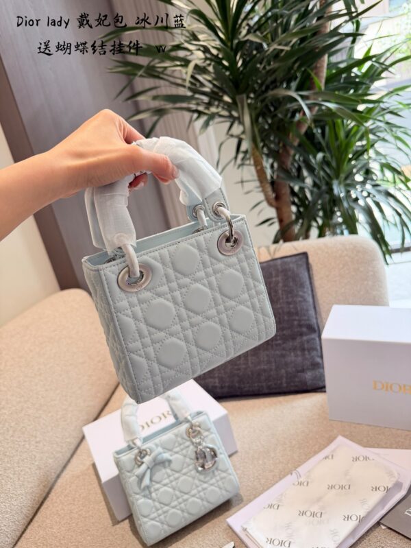 Ice Blue Quilted Bow Top Handle Bag