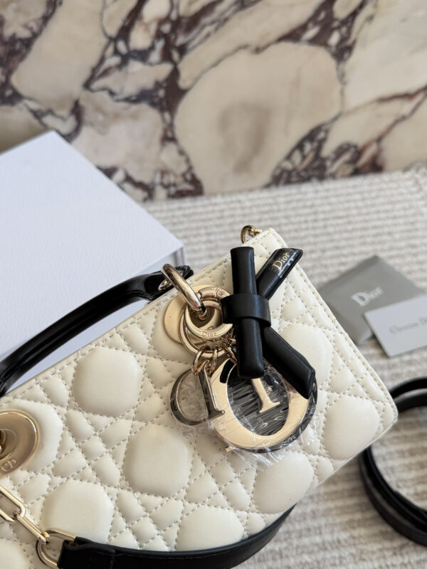 Two-Tone Quilted Bow Top Handle Bag