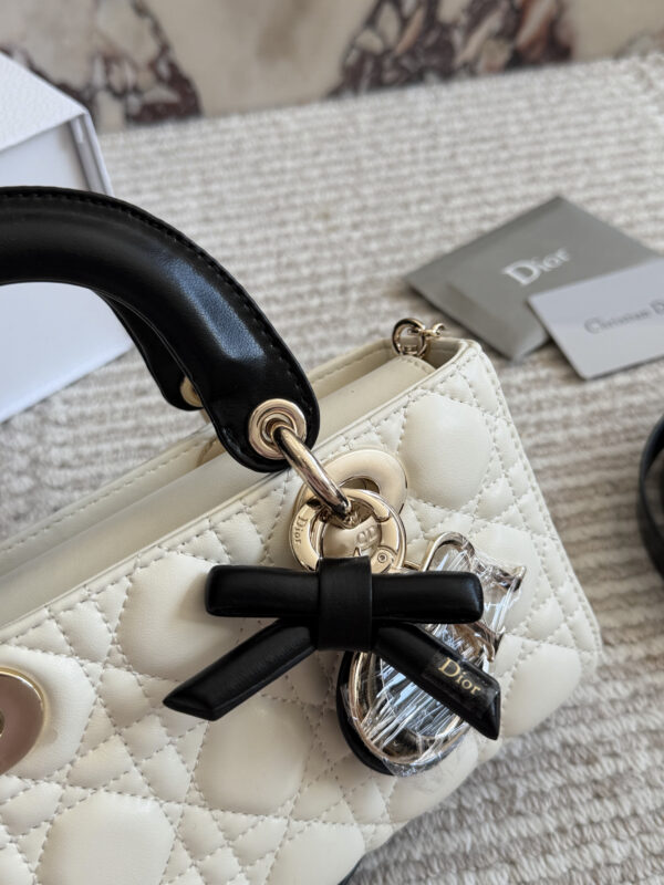 Two-Tone Quilted Bow Top Handle Bag