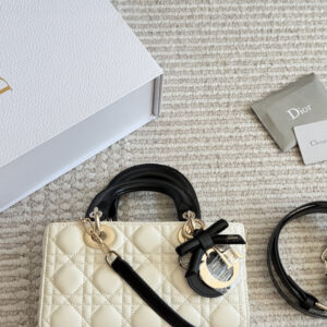 Two-Tone Quilted Bow Top Handle Bag